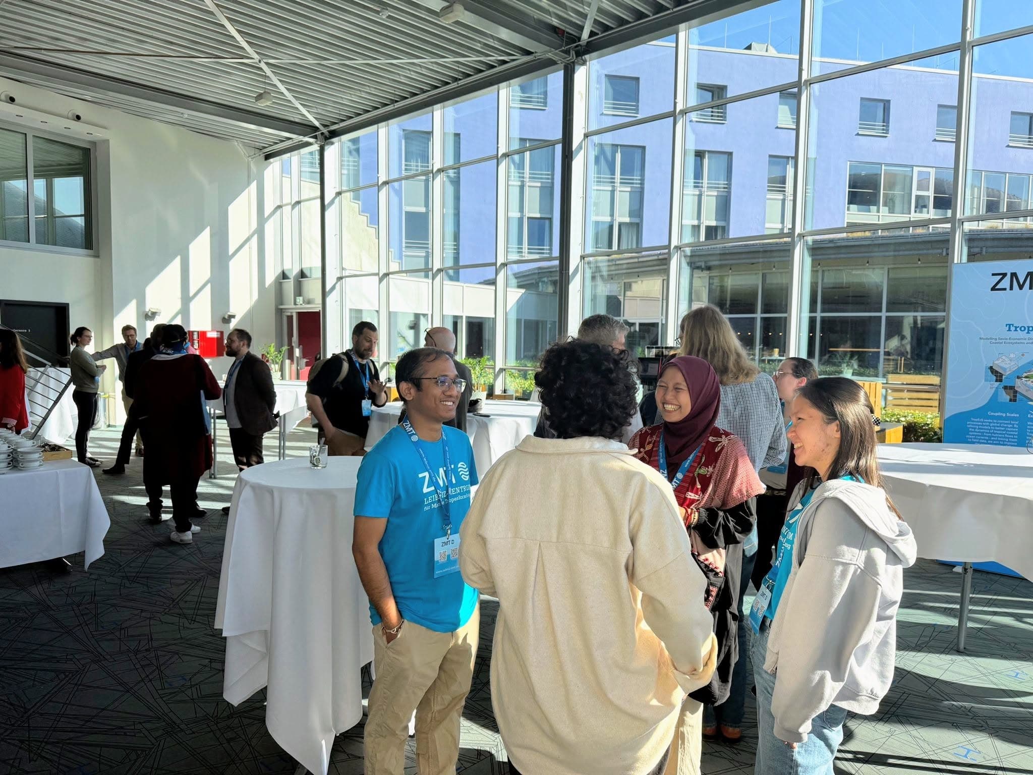 Uachash Barua speaking with colleagues at a Leibniz Centre for Tropical Marine Research gathering