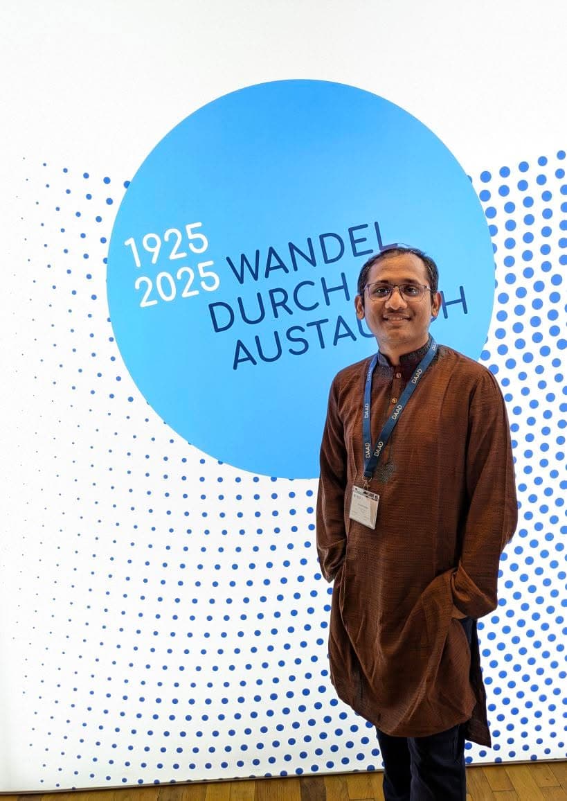 Uachash Barua wearing a DAAD lanyard at a German Academic Exchange Service event